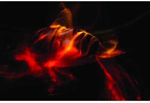 A luminous phoenix with spread wings glows in shades of red, orange and gold against a black background.
