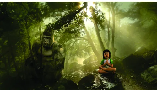 A young girl in a red jacket sits calmly beside a large gorilla on a mossy forest path, surrounded by tall trees and golden sunlight streaming through the canopy.