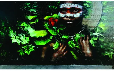Street art canvas depicting a figure with ornamental face markings surrounded by glowing green leaves and foliage against a dark background.