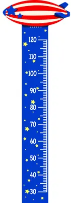 A tall blue height chart with white measurement markings from 30 to 120 centimetres, topped with a red and blue UFO flying saucer and decorated with white stars throughout.