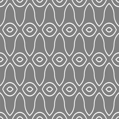 A repeating pattern of white geometric shapes featuring stylised eyes and elongated leaf forms arranged symmetrically on a grey background.