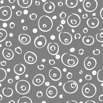 White circles of varying sizes with smaller dots scattered across a grey background in a repeating pattern