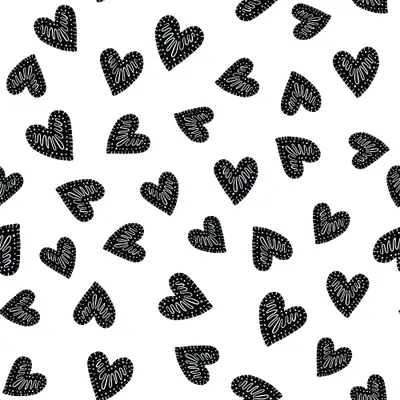 A seamless pattern of black textured hearts in varying sizes scattered randomly across a white background.